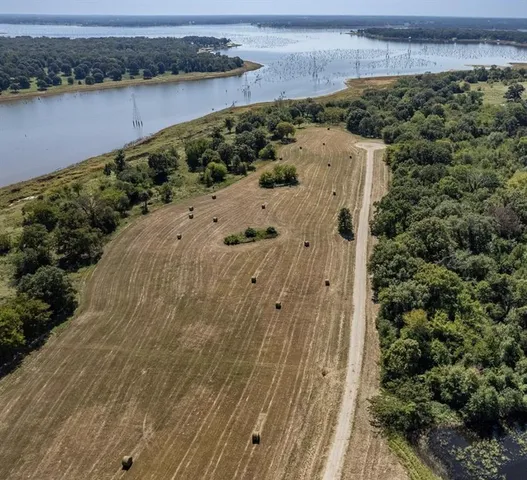 a view of a lake from a yard