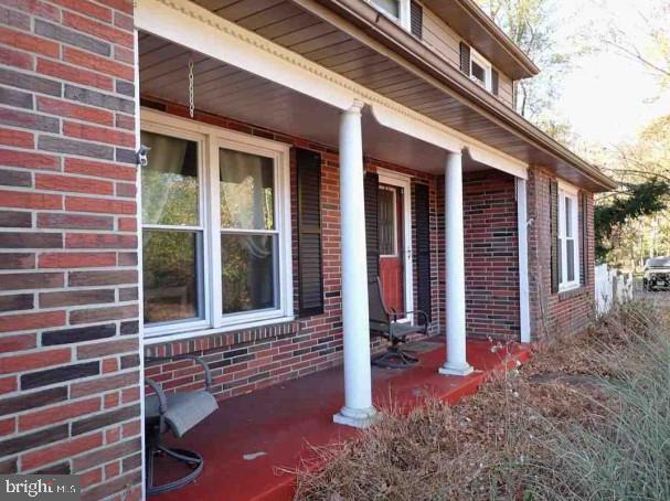 39 Georgia Trail Medford, NJ 08055 - Photo 2 of 13 Charming brick facade with inviting porch.