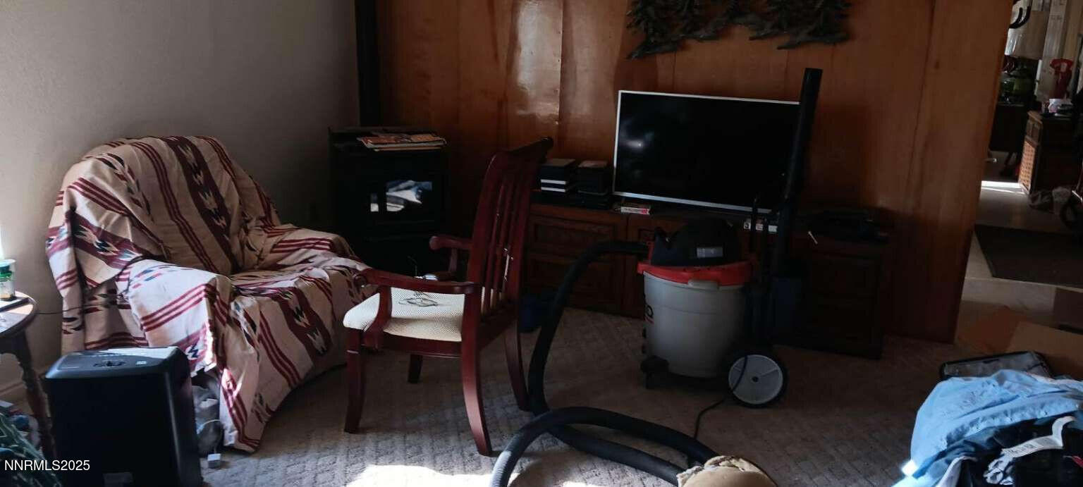1 Iron Mine Road Crescent Valley, NV 89821 - Photo 13 of 46 a living room with furniture and a flat screen tv
