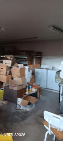 a view of a house with a mountain and a yard