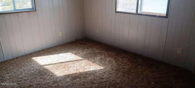 a view of staircase with wooden door