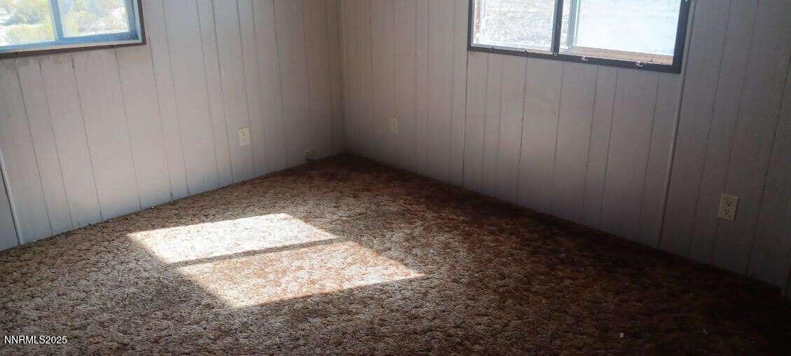 1 Iron Mine Road Crescent Valley, NV 89821 - Photo 24 of 46 an empty room with windows