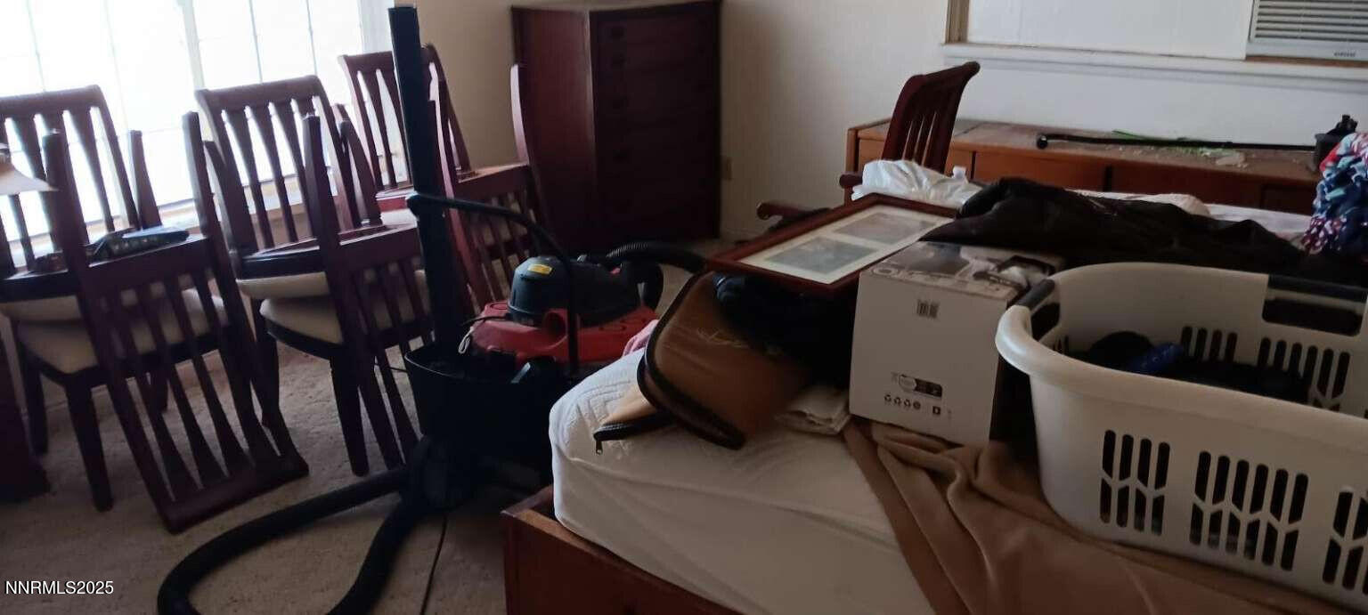 1 Iron Mine Road Crescent Valley, NV 89821 - Photo 26 of 46 a view of chair and wooden floor