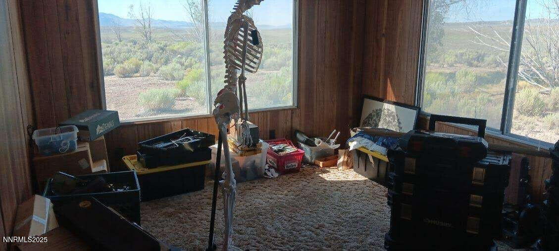 1 Iron Mine Road Crescent Valley, NV 89821 - Photo 28 of 46 a living room with furniture and a window