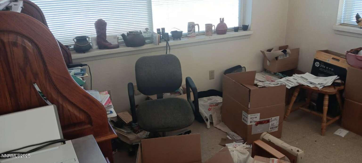 1 Iron Mine Road Crescent Valley, NV 89821 - Photo 42 of 46 a dining room with furniture and wooden floor
