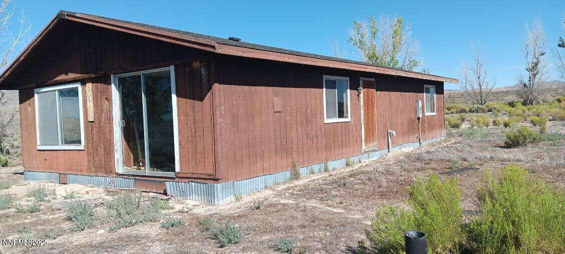 1 Iron Mine Road Crescent Valley, NV 89821 - Photo 5 of 46 a front view of a house with a yard