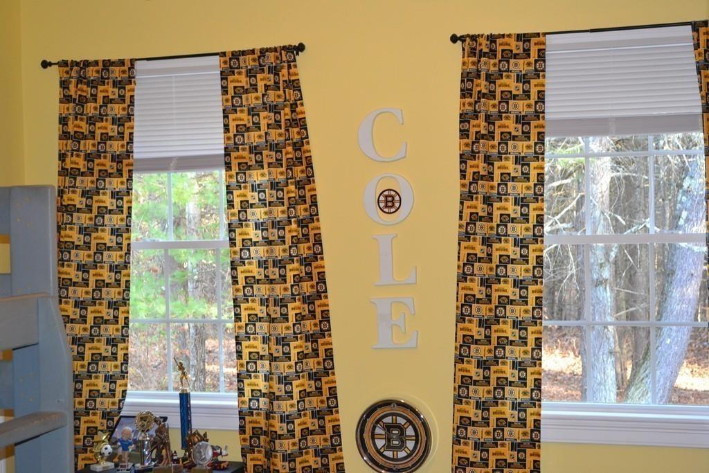 58 Gillespie Road Charlton, MA 01507 - Photo 27 of 39 a bathroom with a shower curtain and a window