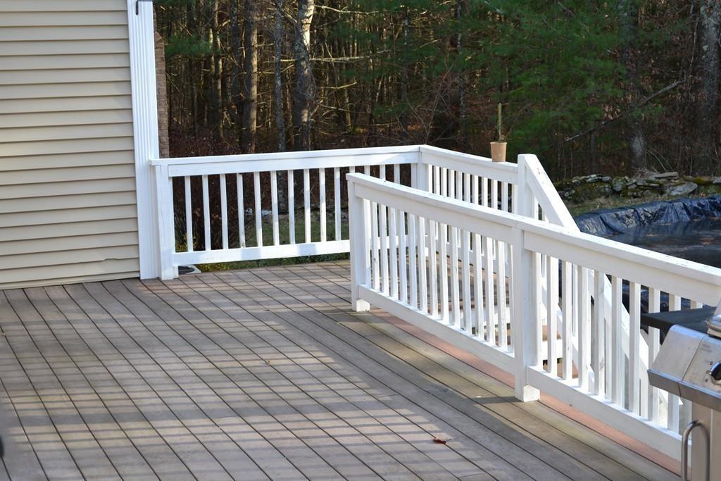58 Gillespie Road Charlton, MA 01507 - Photo 33 of 39 a view of deck and yard with green space