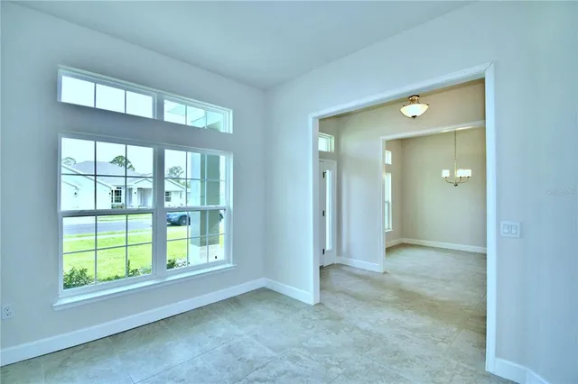 a view of a house with swimming pool and front of a house