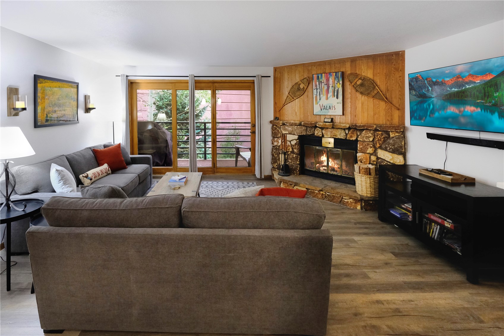 23034 Highway 6, Unit 305 Keystone, CO 80435 - Photo 4 of 27 a living room with furniture and a flat screen tv