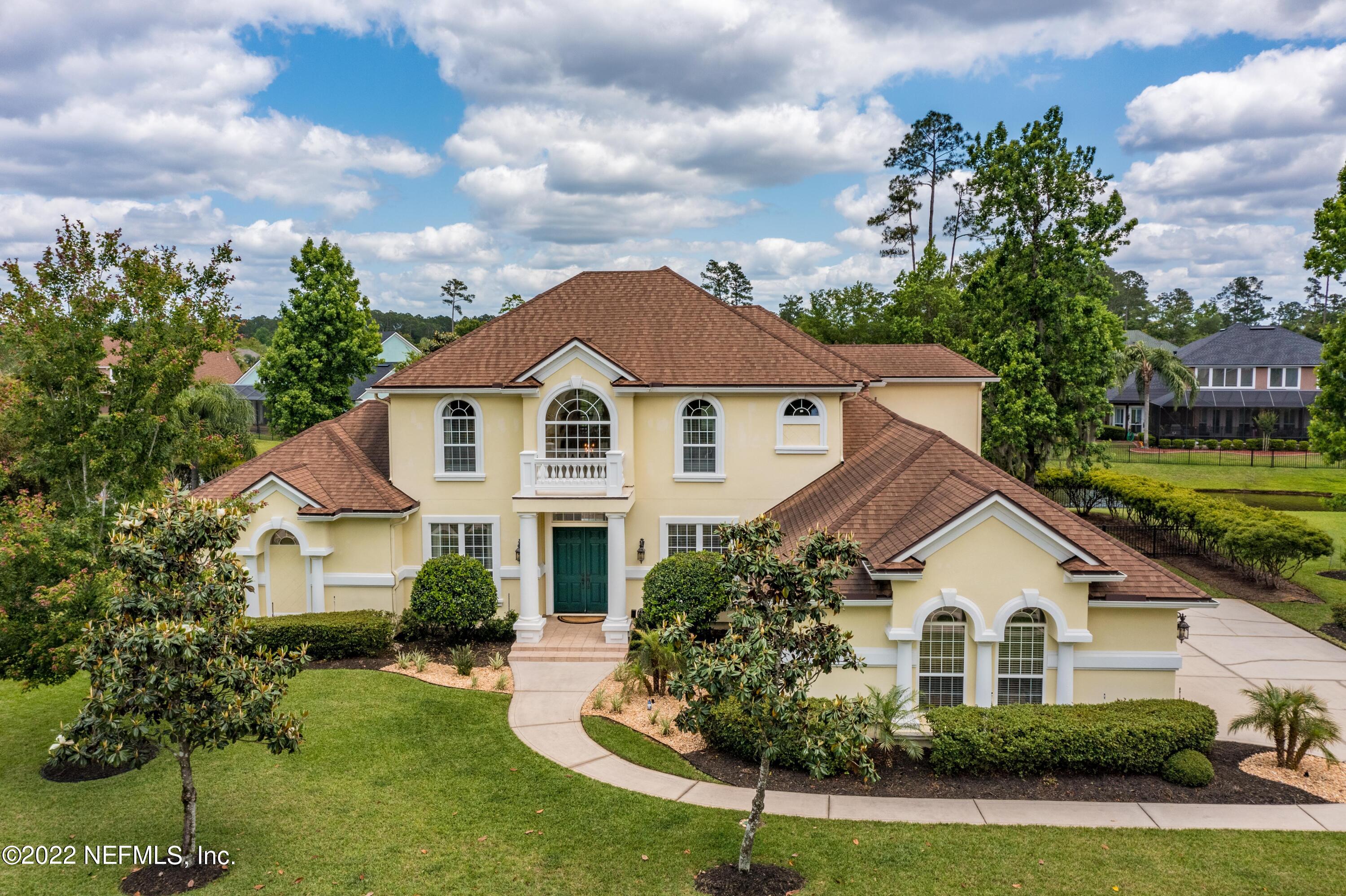 2723 Shade Tree Drive Fleming Island, FL 32003 - Photo 1 of 93 a front view of a house with a yard