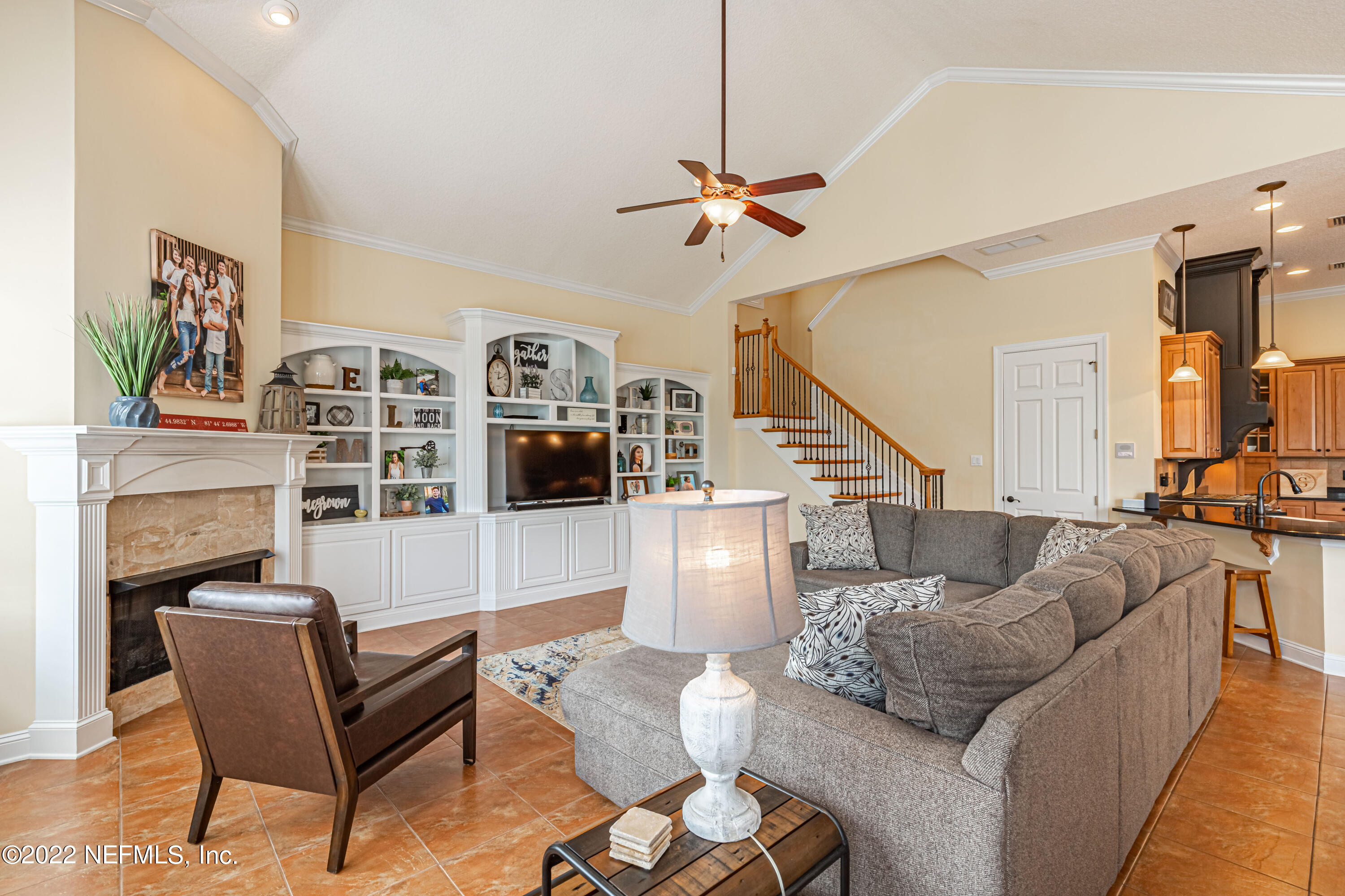 2723 Shade Tree Drive Fleming Island, FL 32003 - Photo 18 of 93 a living room with furniture and a fireplace
