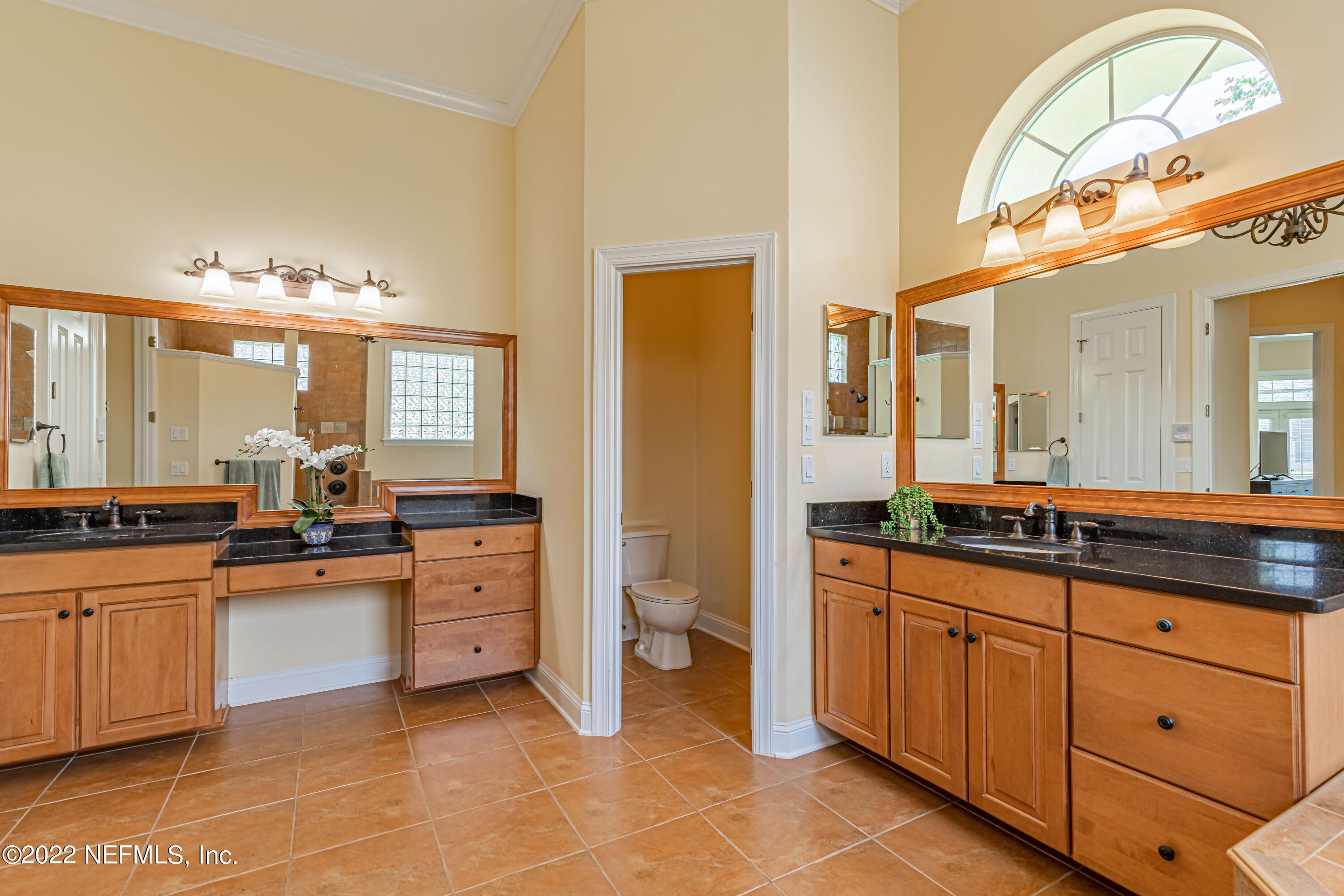 2723 Shade Tree Drive Fleming Island, FL 32003 - Photo 23 of 93 a large bathroom with a large mirror vanity and a sink