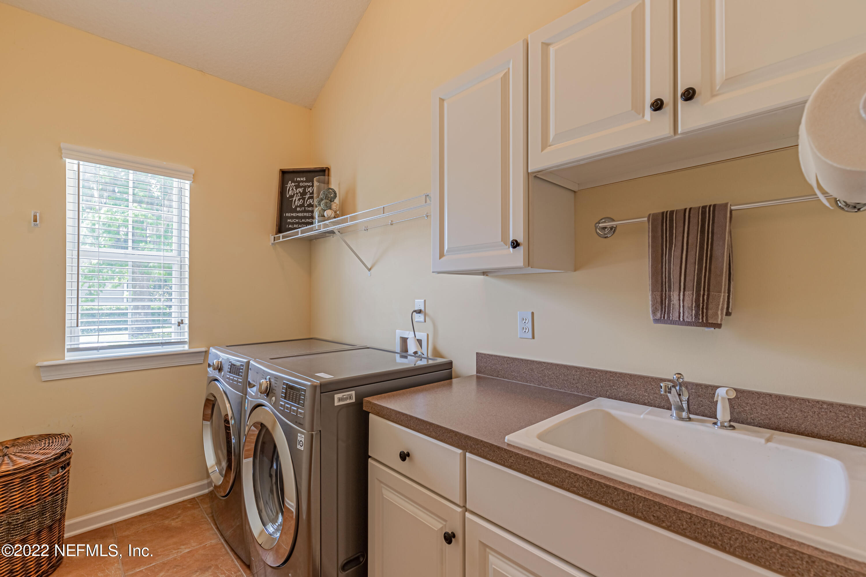 2723 Shade Tree Drive Fleming Island, FL 32003 - Photo 35 of 93 a utility room with dryer and washer
