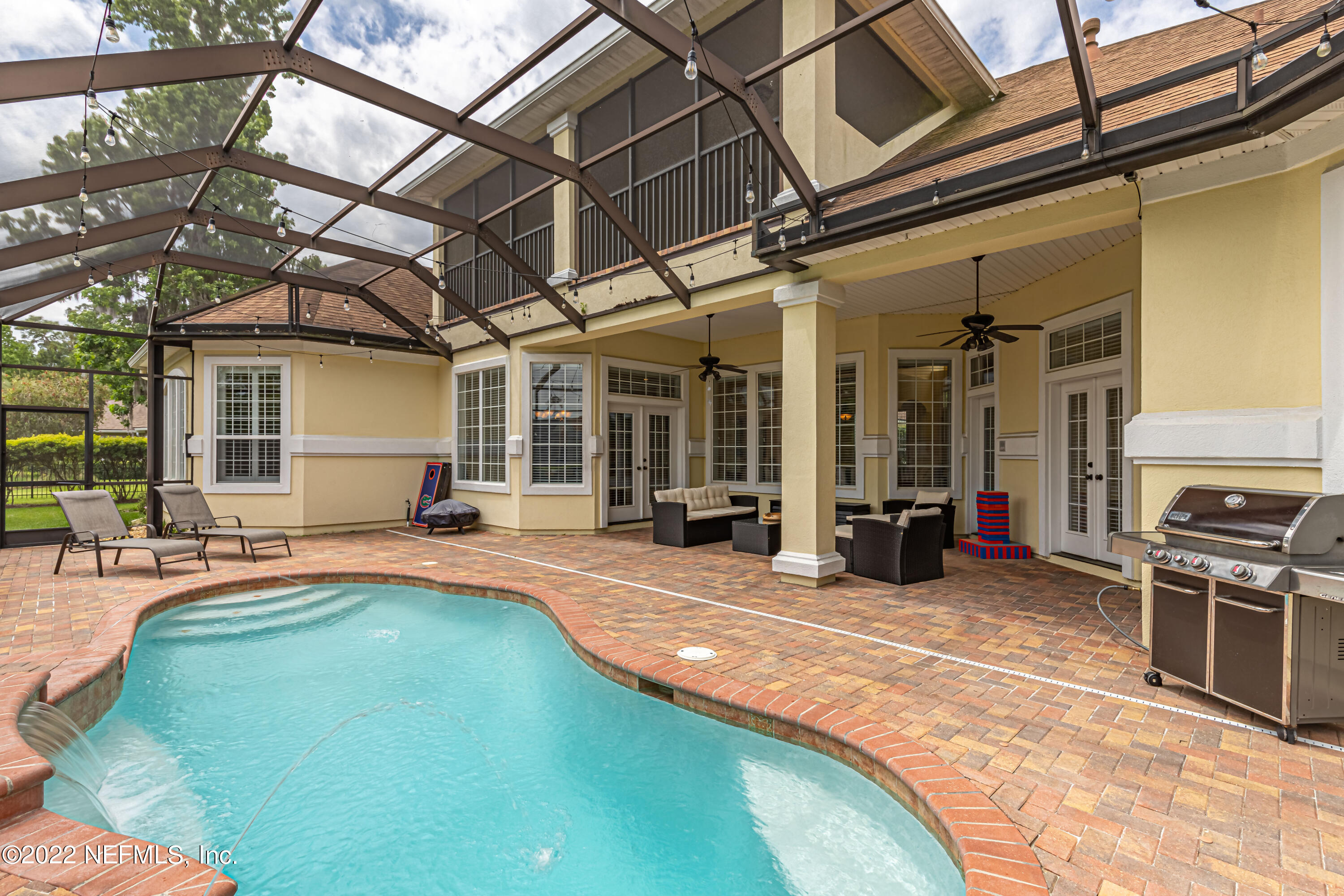 2723 Shade Tree Drive Fleming Island, FL 32003 - Photo 40 of 93 a view of a house with swimming pool and sitting area