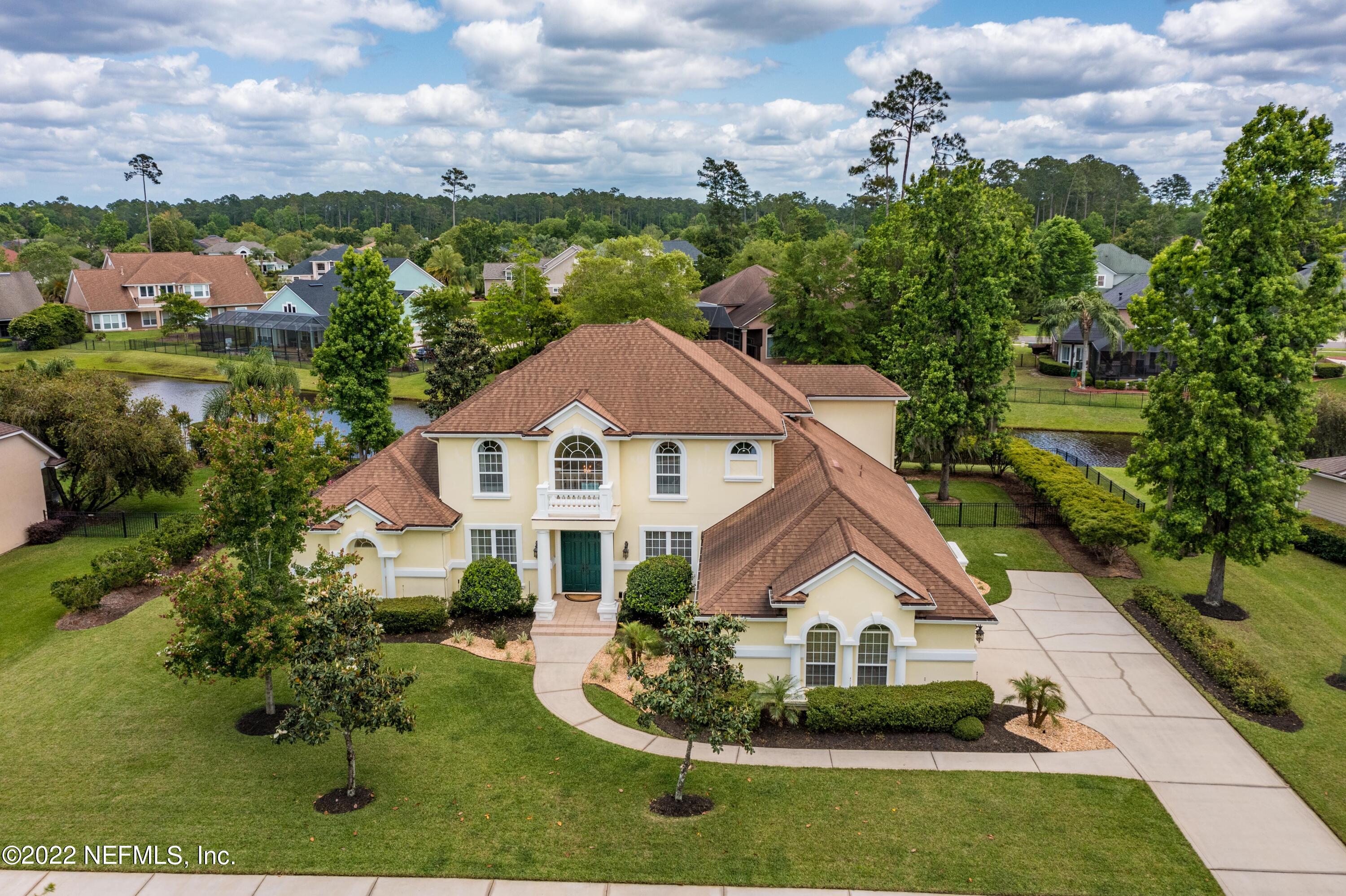 2723 Shade Tree Drive Fleming Island, FL 32003 - Photo 47 of 93 a front view of a house with a yard