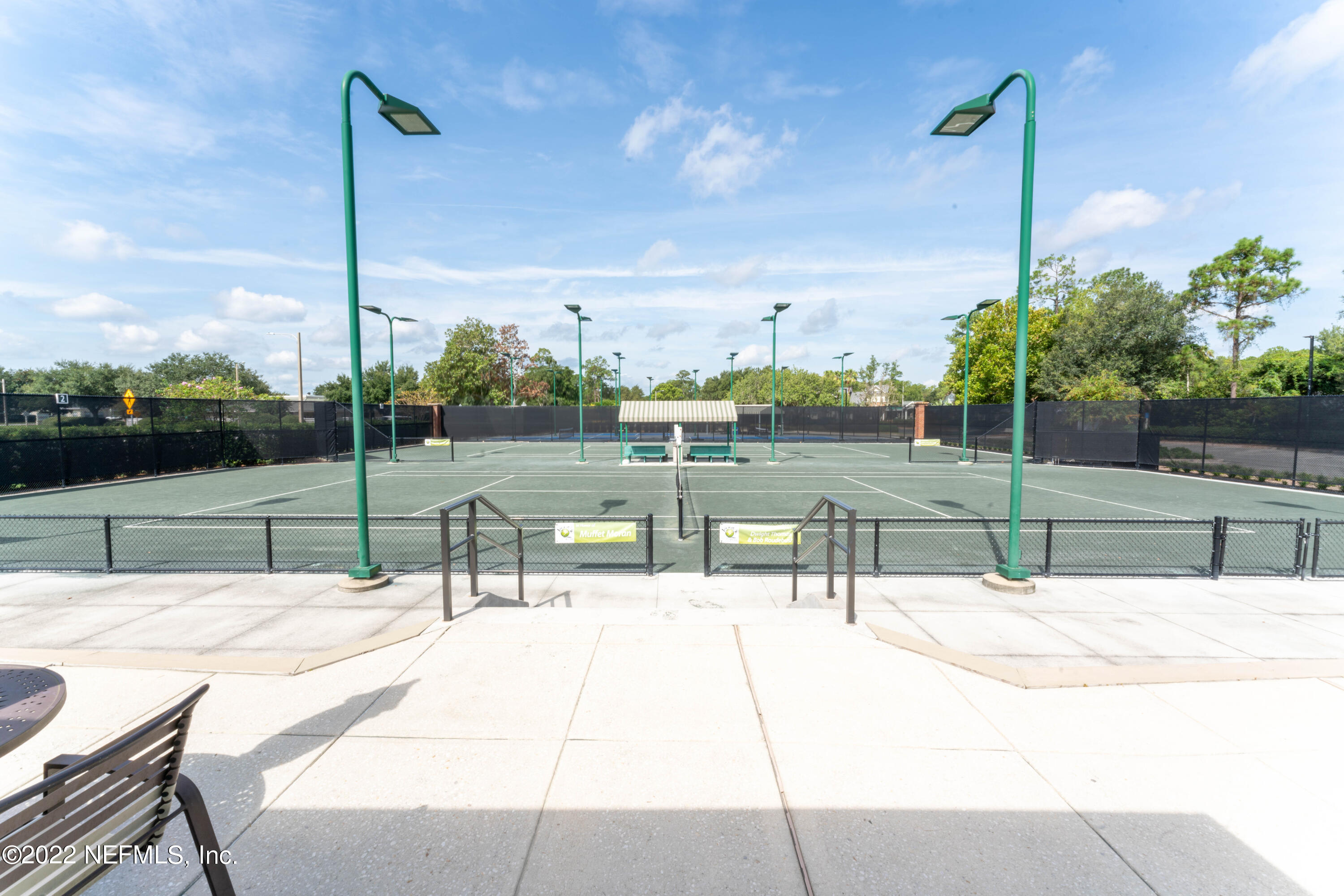 2723 Shade Tree Drive Fleming Island, FL 32003 - Photo 78 of 93 a view of a patio with a table and chairs