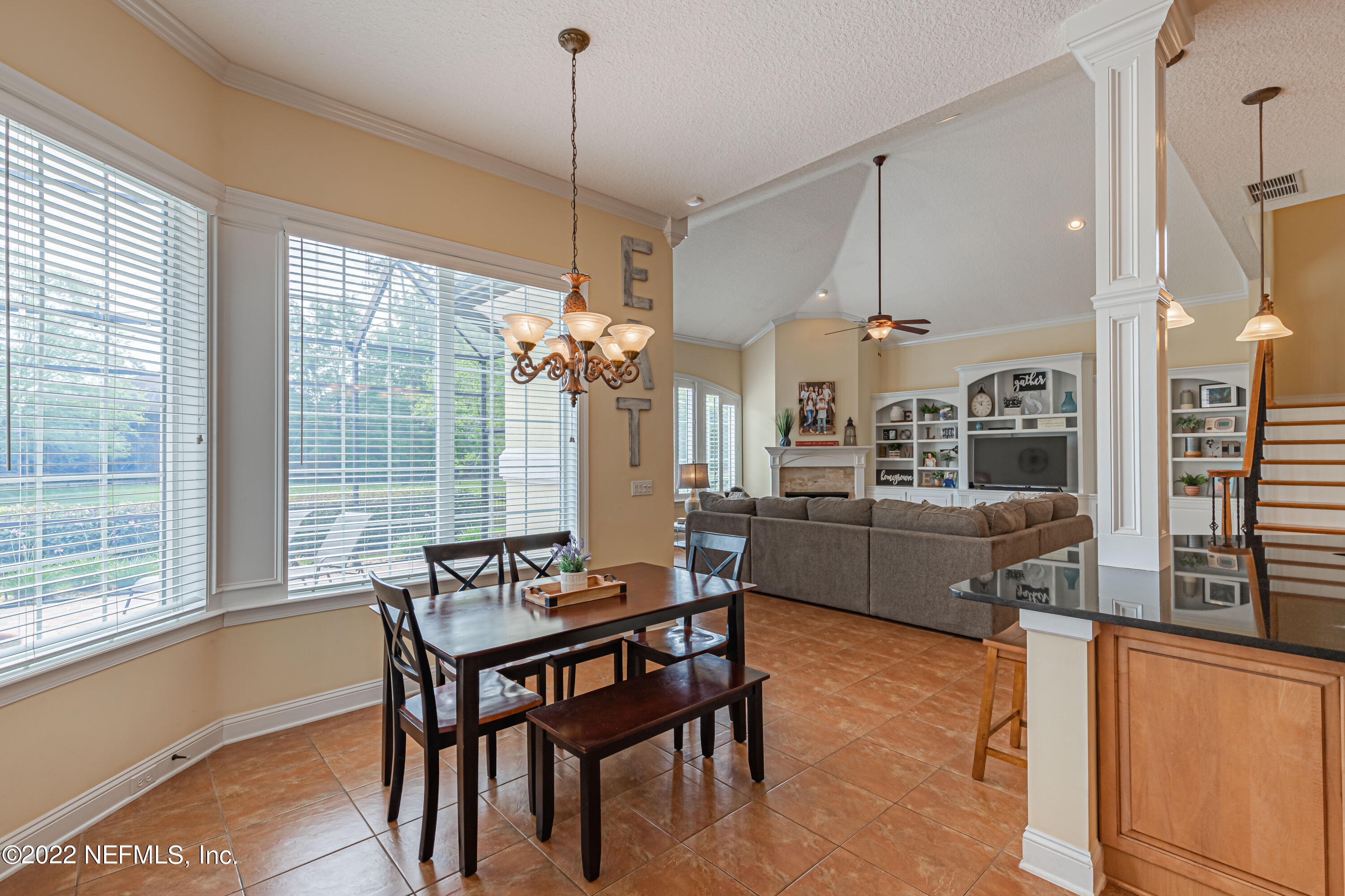 2723 Shade Tree Drive Fleming Island, FL 32003 - Photo 9 of 93 a dining room with furniture and window