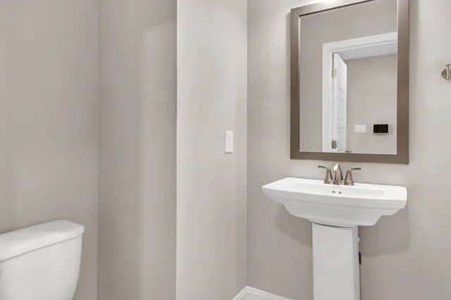 a bathroom with a sink and a toilet