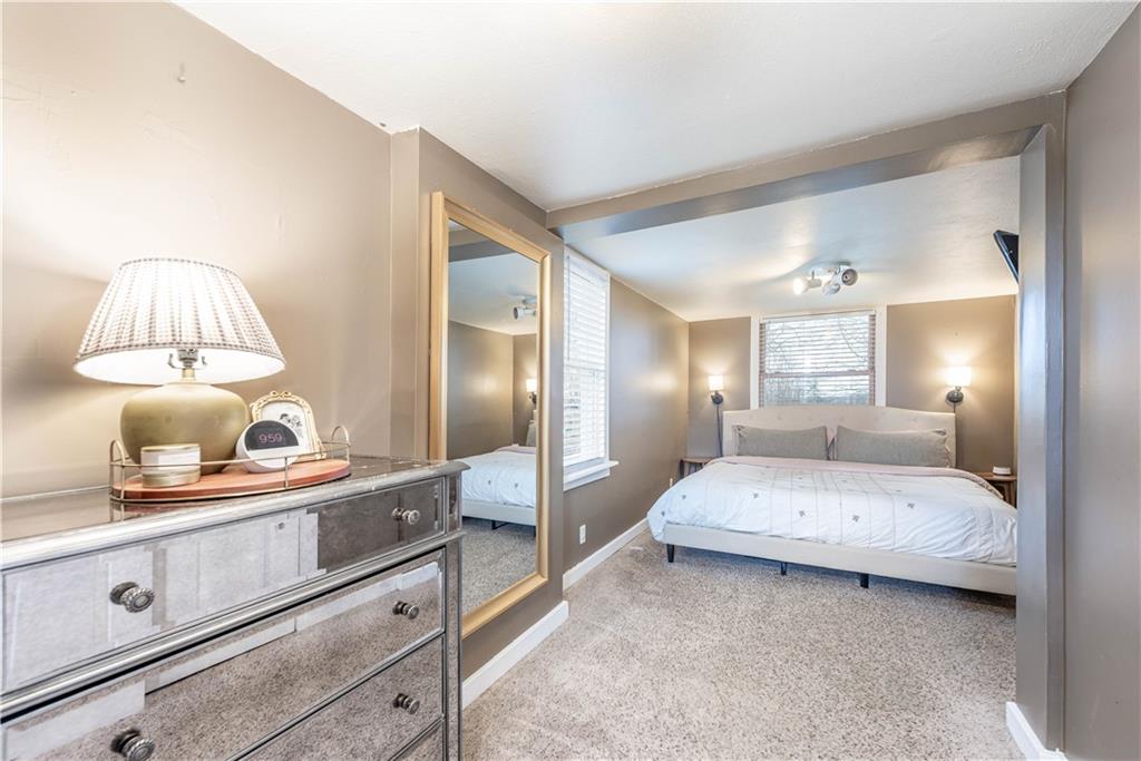 320 Deerfield Road Washington, PA 15301 - Photo 15 of 32 a bedroom with a bed and a mirror on dresser