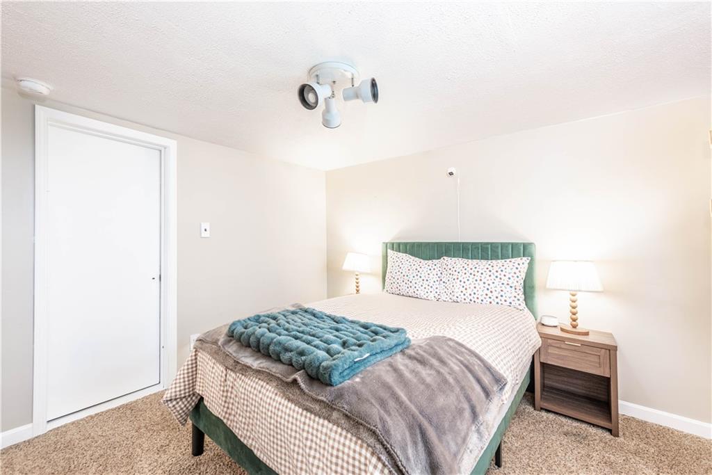 320 Deerfield Road Washington, PA 15301 - Photo 18 of 32 a bedroom with a bed and a window