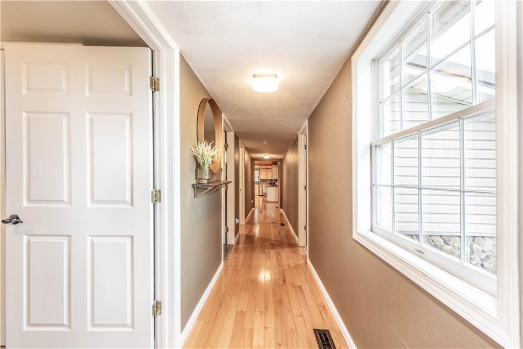 320 Deerfield Road Washington, PA 15301 - Photo 23 of 32 a view of hallway with wooden floor and staircase