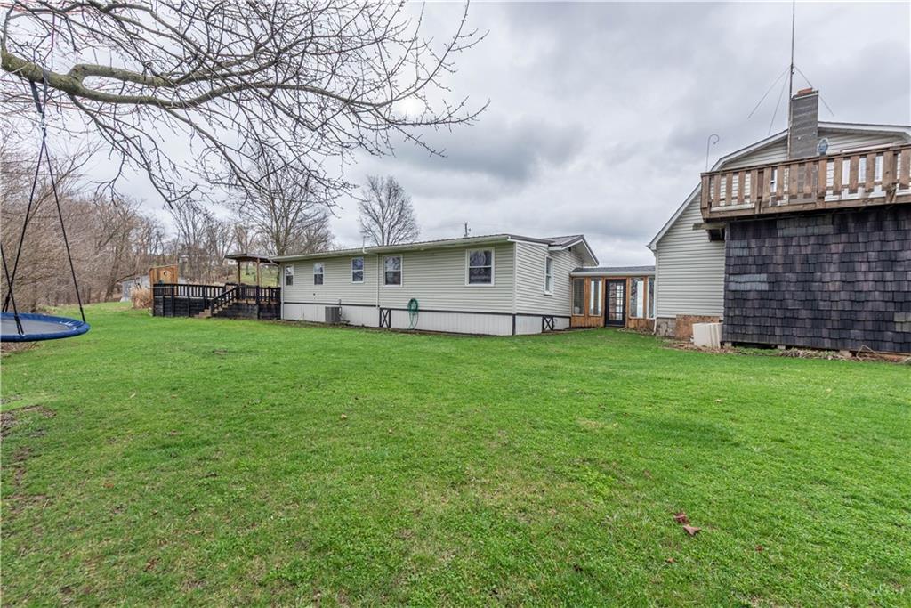 320 Deerfield Road Washington, PA 15301 - Photo 32 of 32 a view of a house with a big yard and large trees