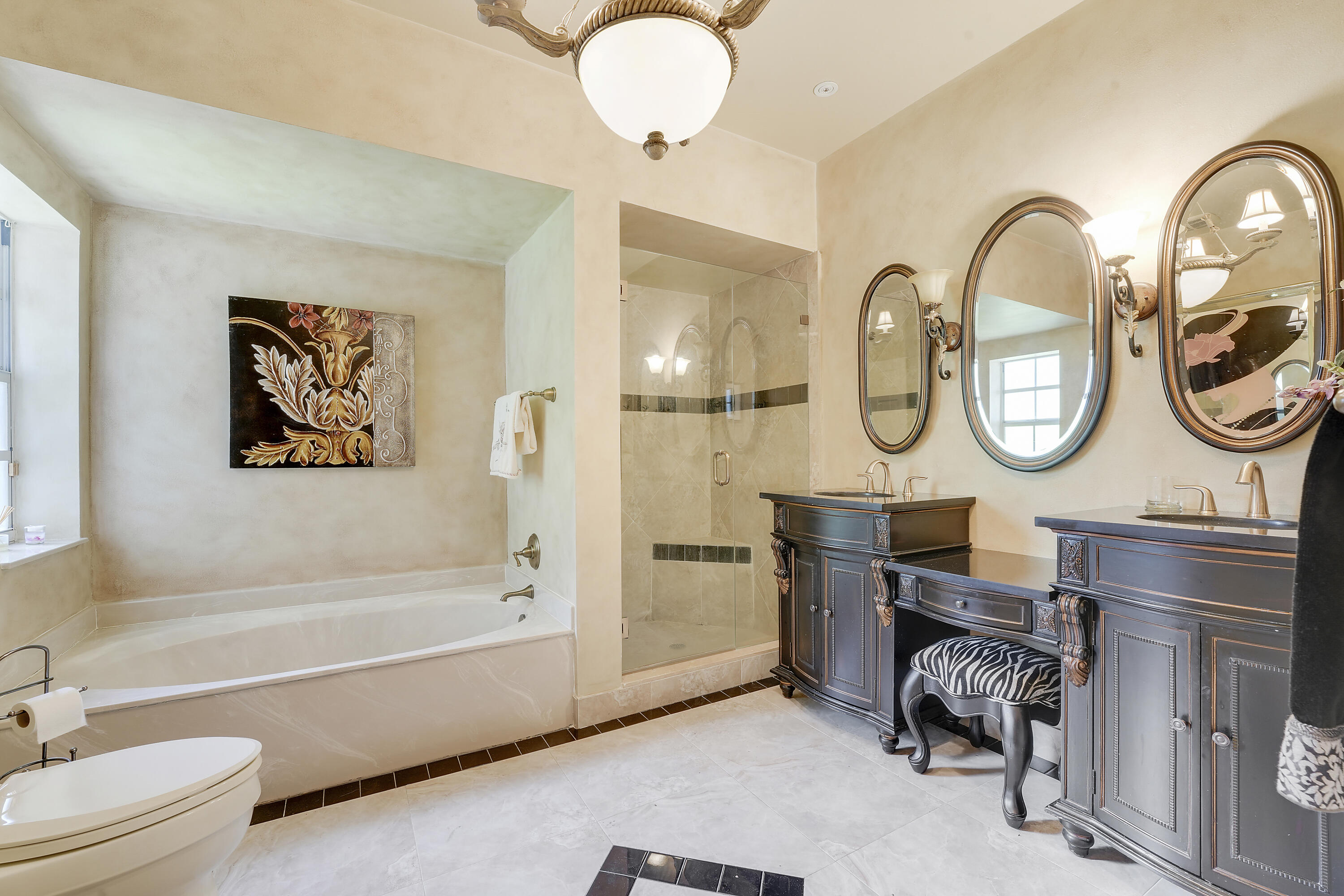 7599 Cinebar Drive, Unit 36U Boca Raton, FL 33433 - Photo 17 of 26 Primary Bathroom Suite