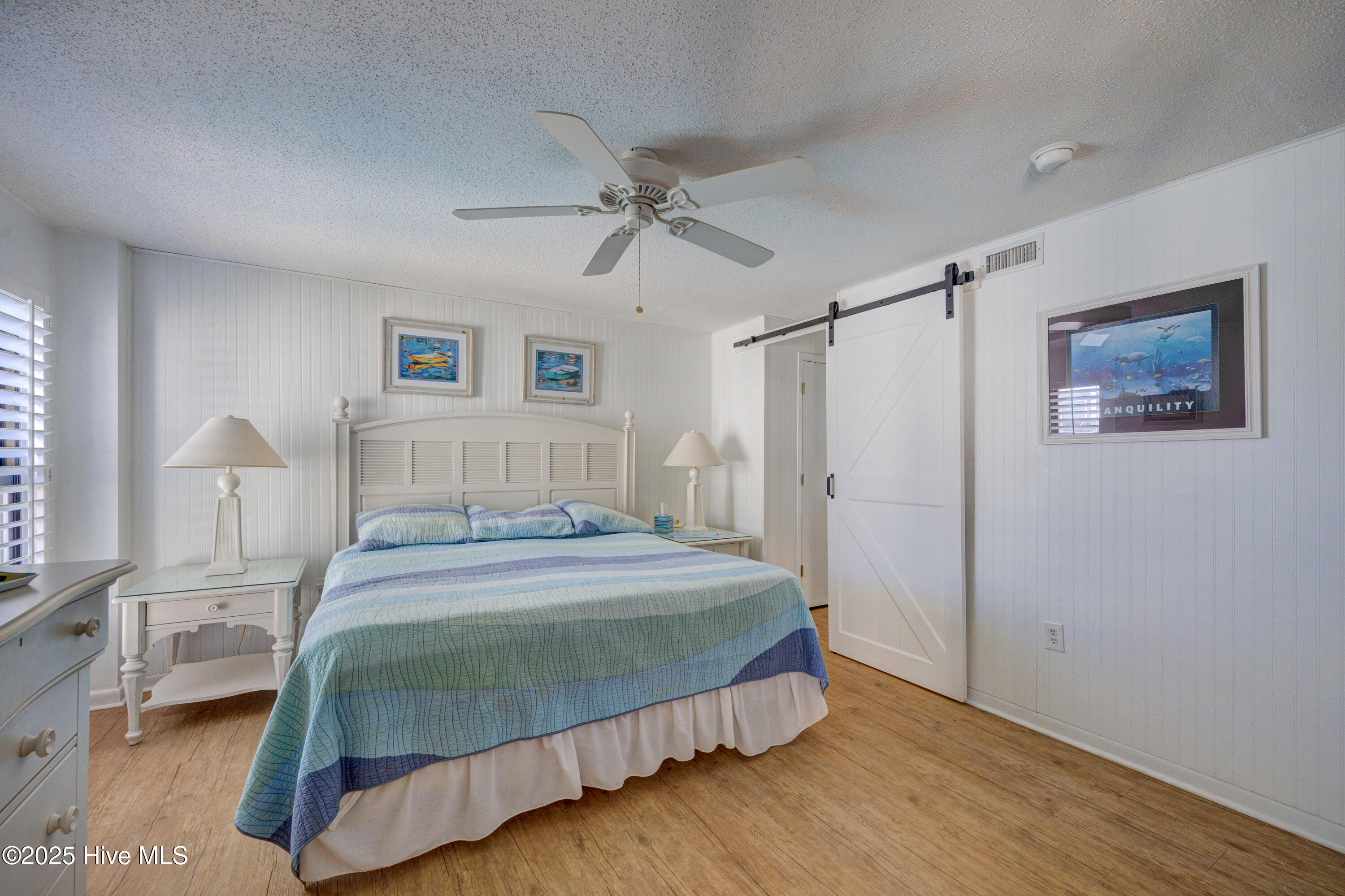 1505 Salter Path Road, Unit 435 Indian Beach, NC 28512 - Photo 17 of 29 Primary BR with Barn Door