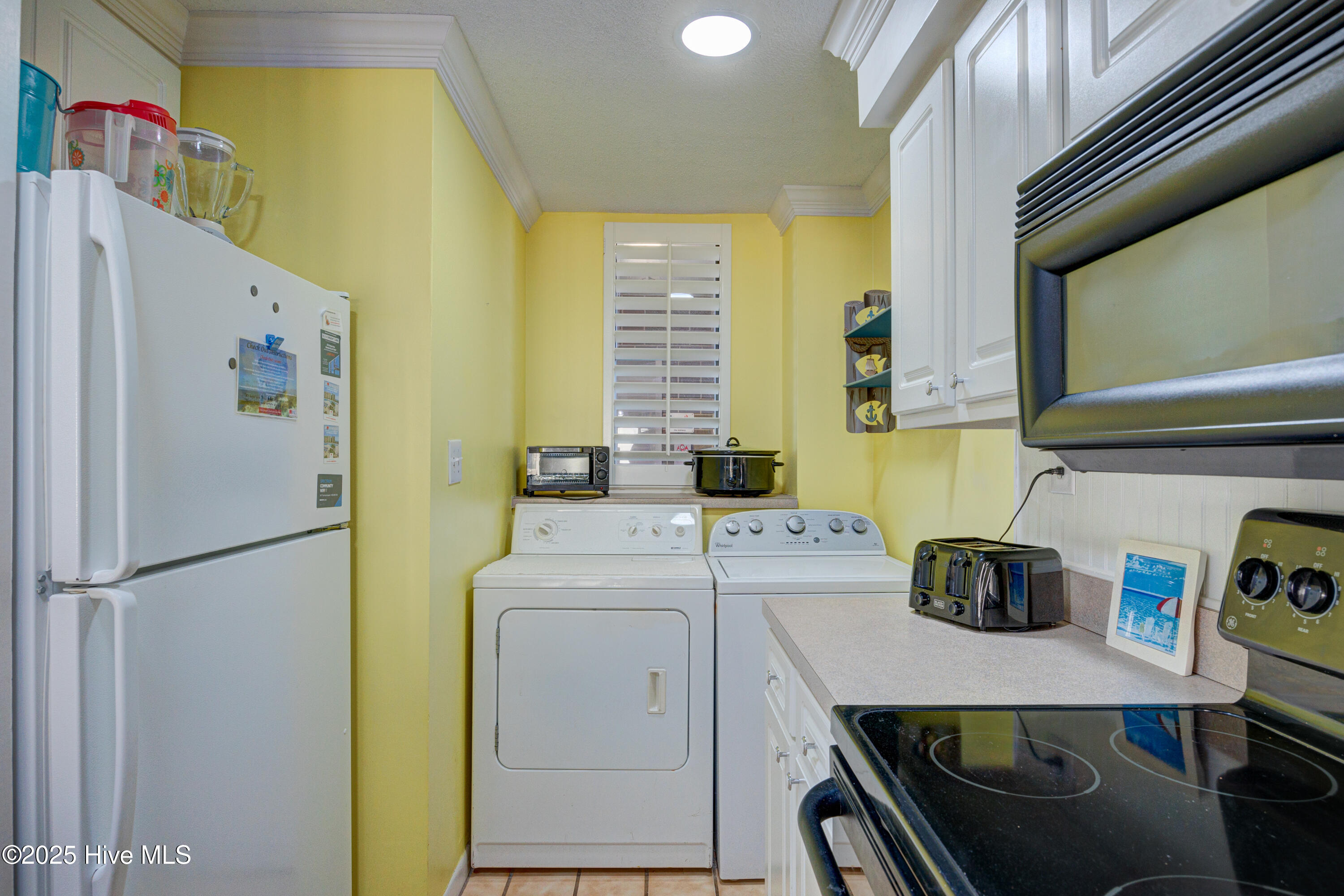 1505 Salter Path Road, Unit 435 Indian Beach, NC 28512 - Photo 7 of 29 Kitchen/Laundry Combo