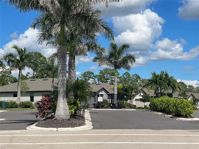 a kitchen with stainless steel appliances granite countertop a stove and white cabinets