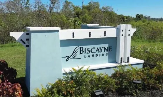 a view of kitchen with furniture and flat screen tv