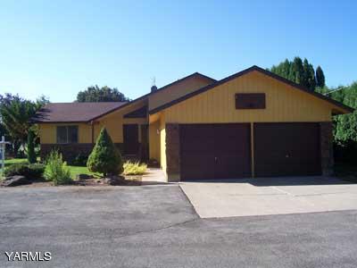 50 Forney Road Cowiche, WA 98947 - Photo 2 of 21 a front view of a house with a yard