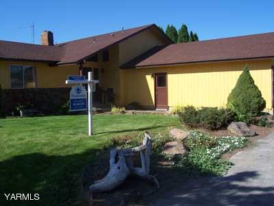 50 Forney Road Cowiche, WA 98947 - Photo 3 of 21 a front view of a house with garden