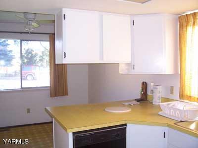 50 Forney Road Cowiche, WA 98947 - Photo 6 of 21 a kitchen with a sink and a window