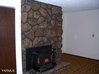 50 Forney Road Cowiche, WA 98947 - Photo 7 of 21 a room with a fireplace
