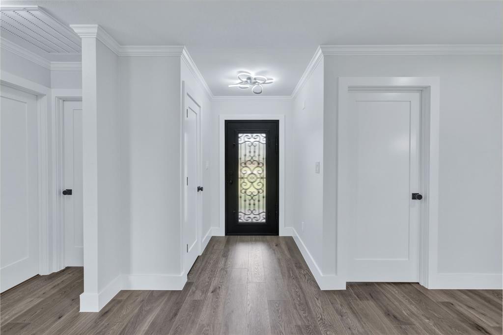11345 Jennifer Circle Sanger, TX 76266 - Photo 11 of 39 a view of a hallway with wooden floor