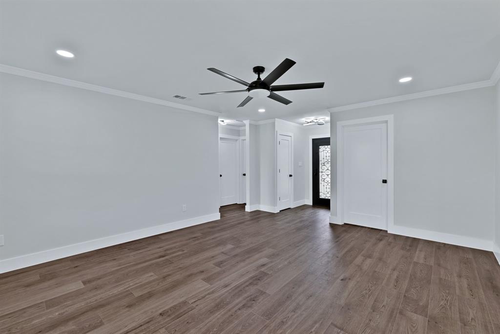 11345 Jennifer Circle Sanger, TX 76266 - Photo 14 of 39 a view of an empty room with wooden floor