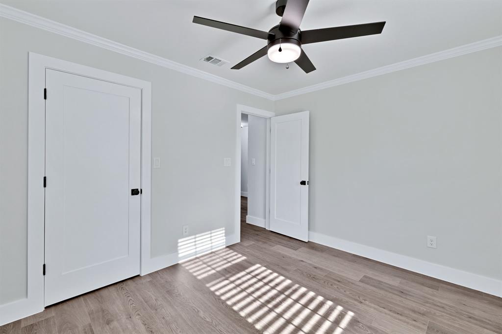 11345 Jennifer Circle Sanger, TX 76266 - Photo 24 of 39 a view of an empty room and wooden floor