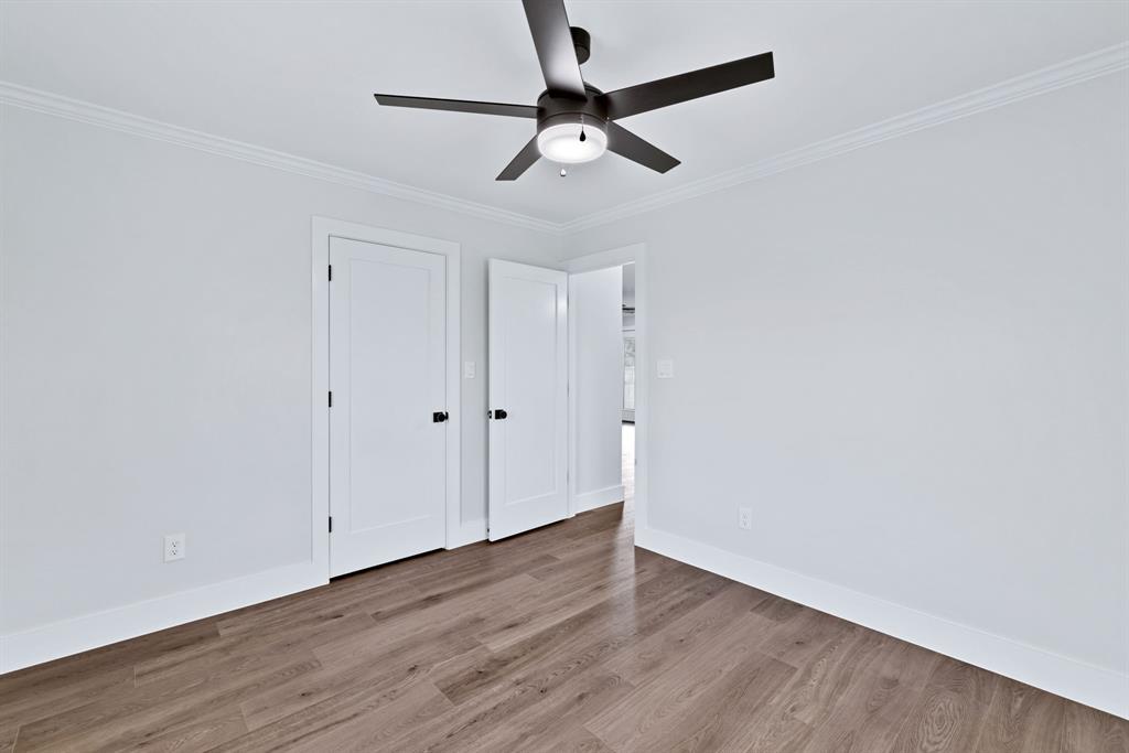 11345 Jennifer Circle Sanger, TX 76266 - Photo 27 of 39 a view of a room with wooden floor and white walls