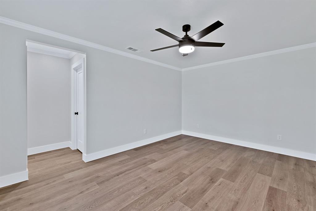 11345 Jennifer Circle Sanger, TX 76266 - Photo 29 of 39 a view of an empty room with wooden floor