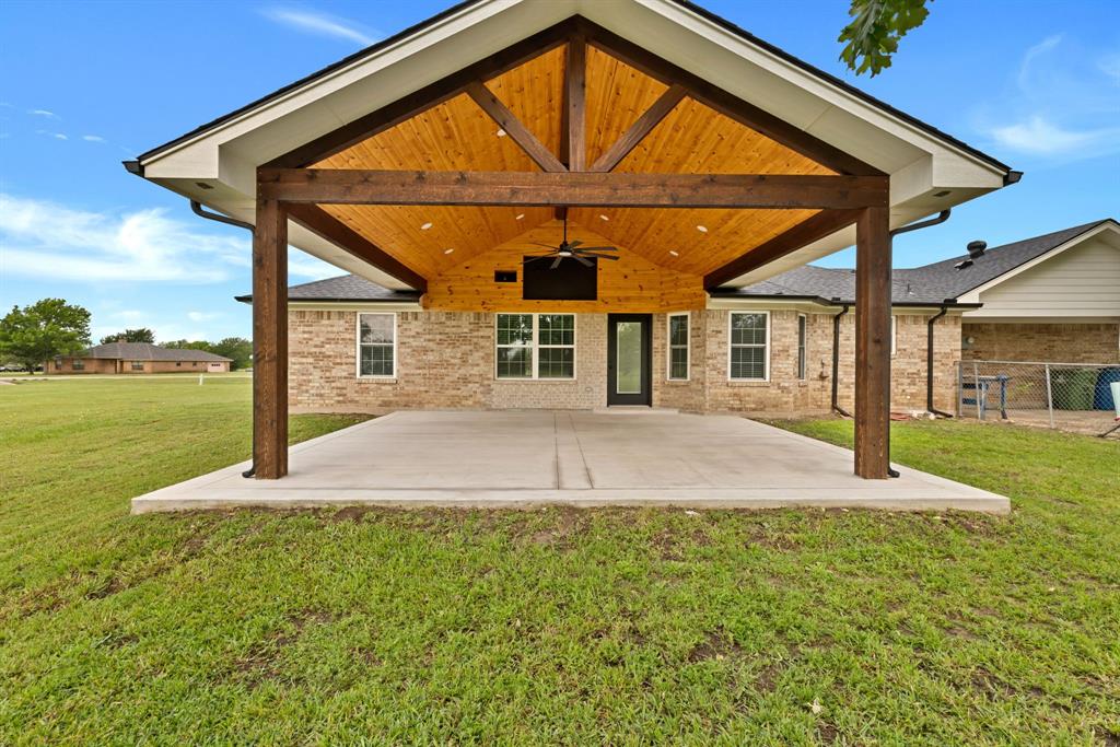 11345 Jennifer Circle Sanger, TX 76266 - Photo 35 of 39 a view of a house with backyard and porch