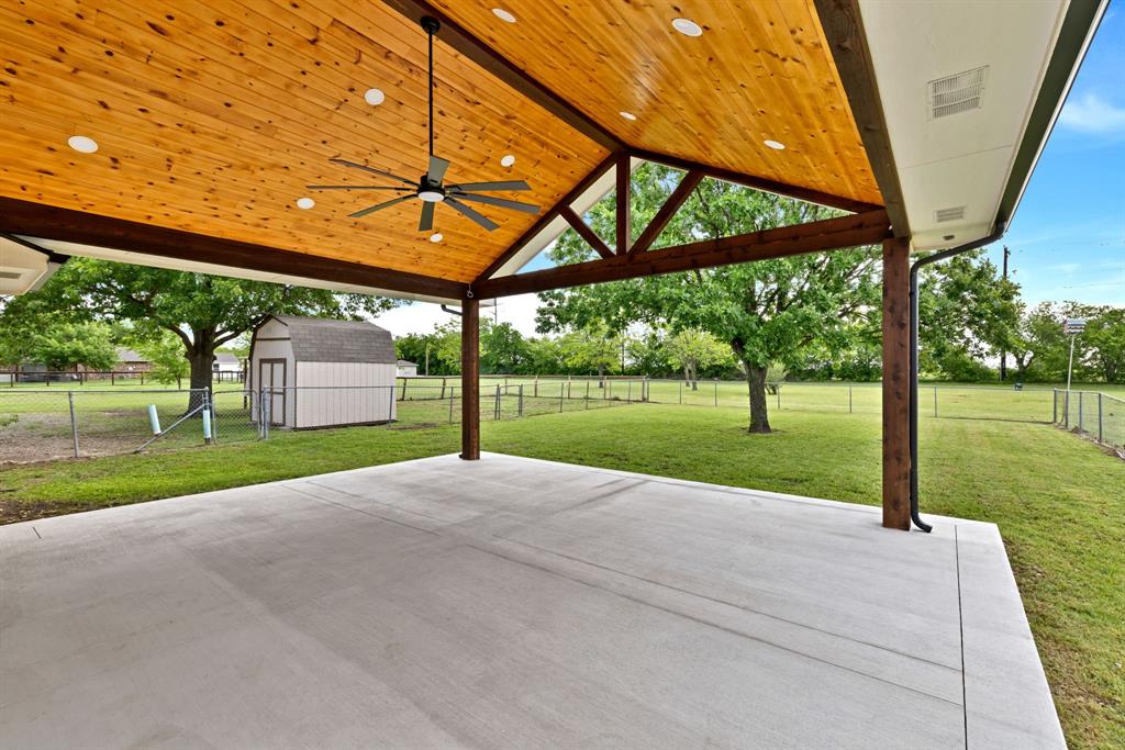 11345 Jennifer Circle Sanger, TX 76266 - Photo 36 of 39 a view of a house with backyard and a garden