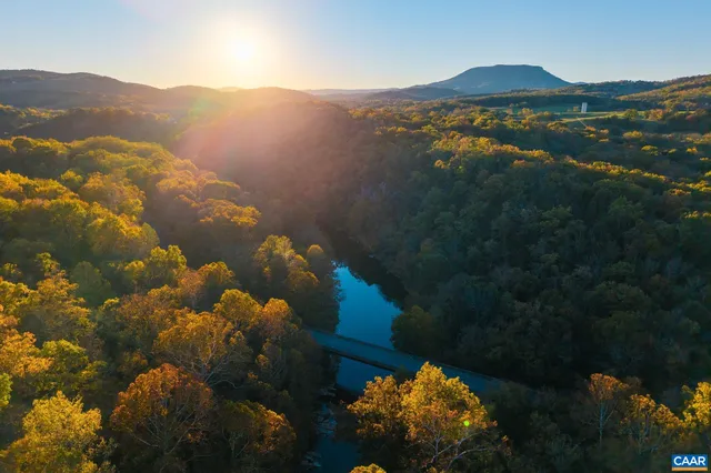 a view of a city with mountains in the background