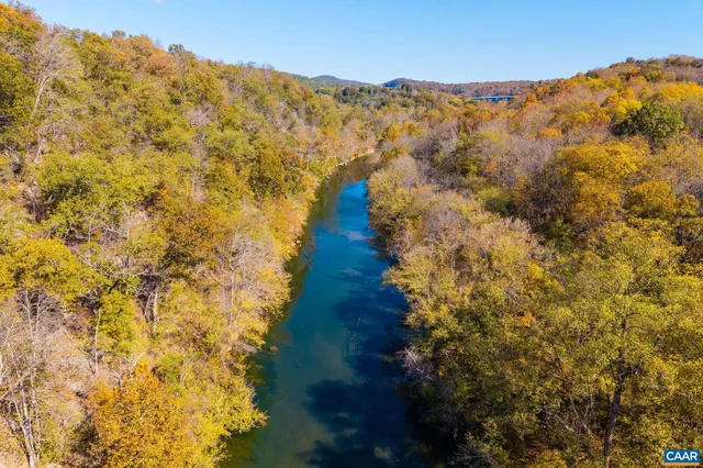 an aerial view of residential house with outdoor space