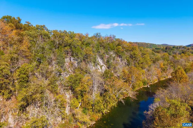 a view of a lake with a house