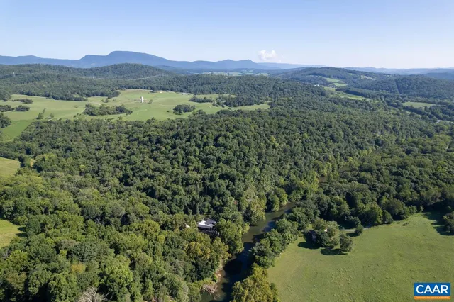 a view of lake with mountain