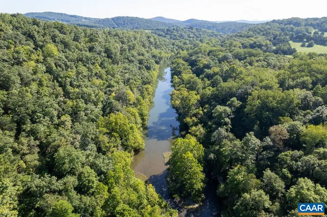 a view of a lake with a mountain