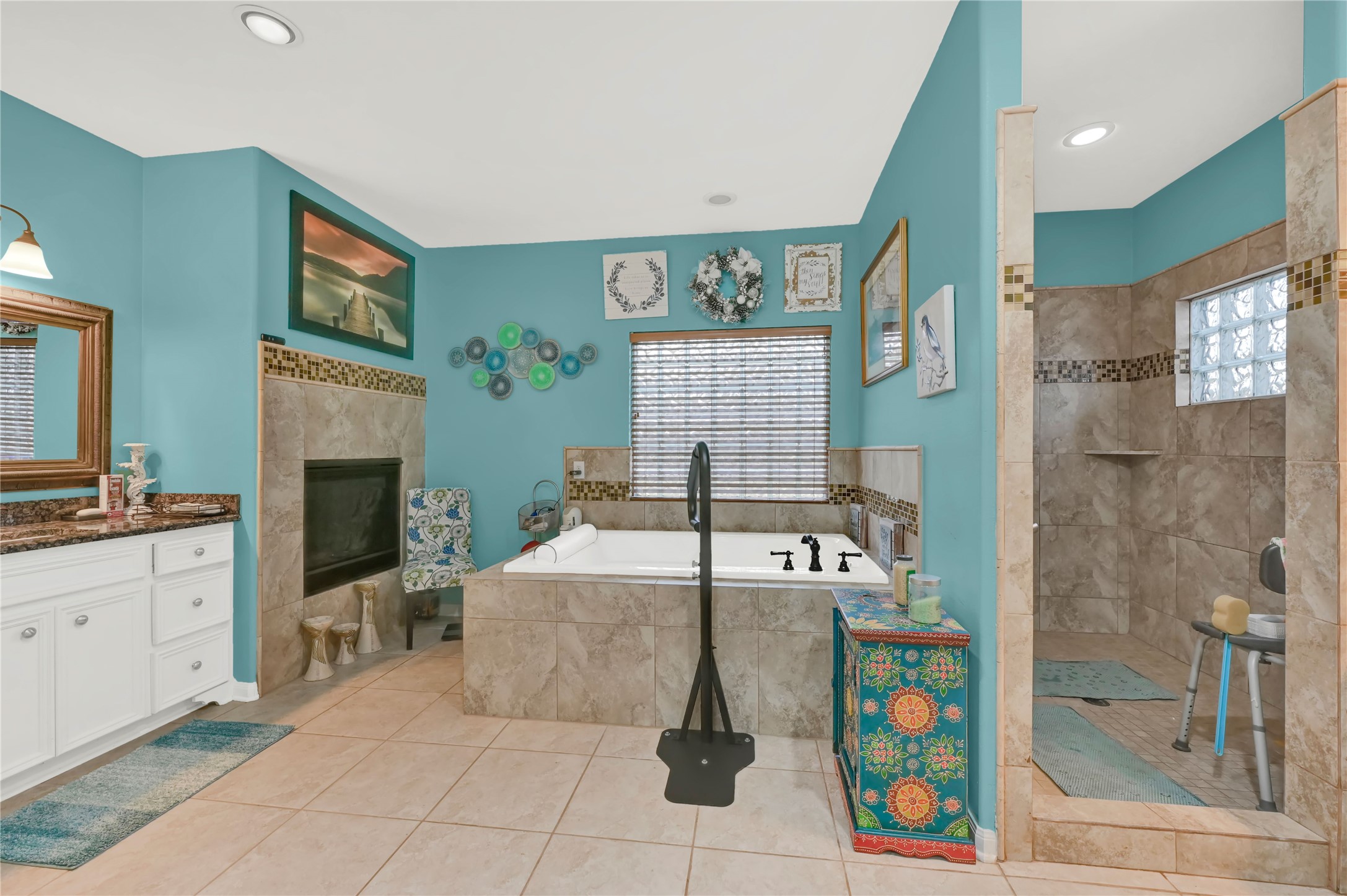 16423 County Road 528 Rosharon, TX 77583 - Photo 21 of 35 a bedroom with a bed and a chandelier