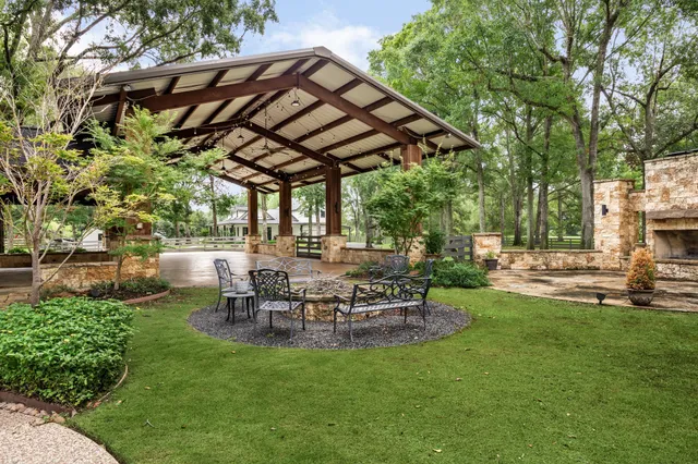 a view of a chair and table of the garden